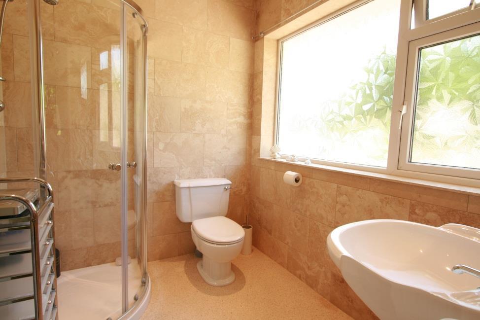 Door to: En-Suite Shower Room 7 x 5 8 White 3 piece suite comprising