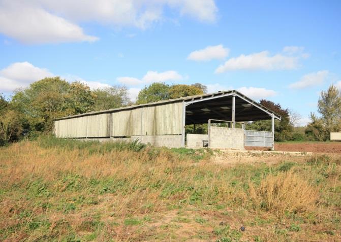 FORMER MILKING SHED WITH HAYLOFT AND A CONTEMPORARY PORTAL SPAN BUILDING