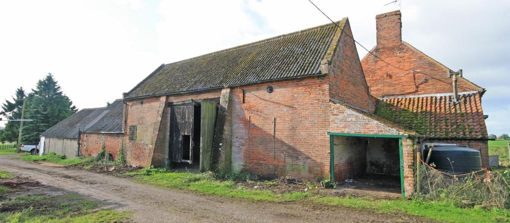 THE OLD THRESHING BARN (AS HATCHED PINK ON PLAN) A substantial period threshing barn with an attached range of single storey buildings which face into an enclosed courtyard to the south side of the