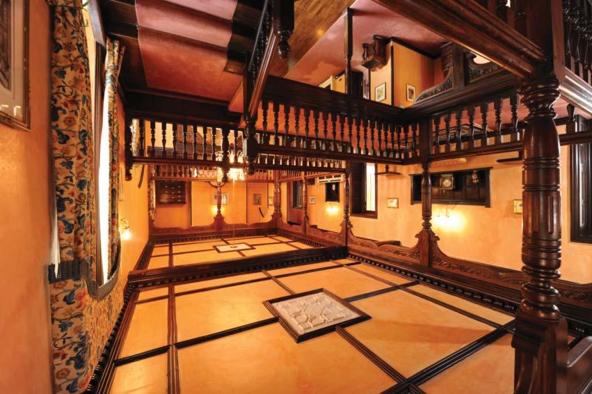 A feature is the impressive double minstrel gallery and wide three tiered staircase.