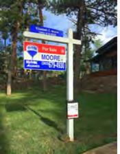Moore at RE/MAX Marketing Systems Yard Signs: Signage is bold bright and easy to read.