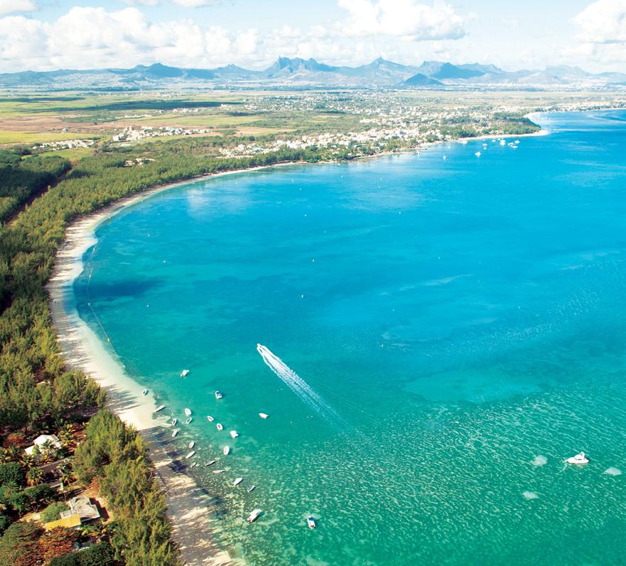 Live HOLIDY LIFE In the North West part of Mauritius, between Trou aux Biches and Grand Baie, lies the magnificent beach of Mon Choisy, a privileged panorama which combines a white sandy lagoon,