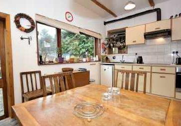 A two bedroom mid terrace railway cottage with excellent potential in the Cairngorms National Park and within easy