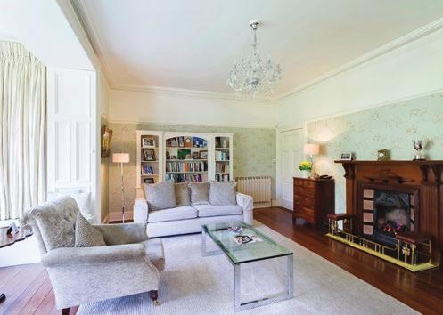 Drawing Room: Very spacious, light-filled reception room with feature antique marble fire place, large picture window with fitted window seat and views over the garden. Door to sun terrace.