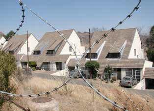 LESOTHO HOUSING PROFILE FIGURE 33 Houses in LHLDC s gated Friebel Estate, central Maseru The ministry responsible for housing, MLGCPA, is currently building a small estate of 17