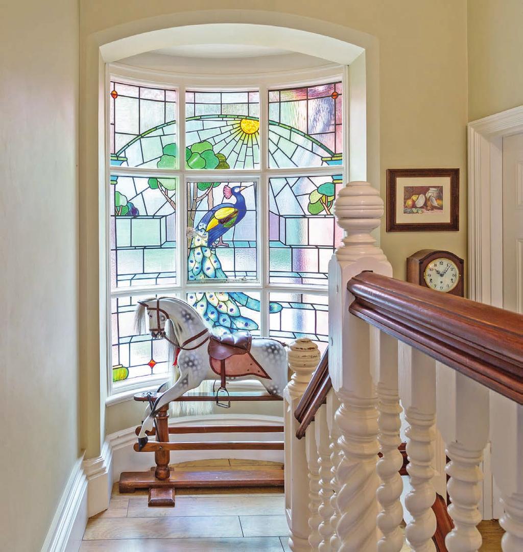 A stunning feature of the property is the large split level landing with a breath-taking stained glass window which is also the real centrepiece when looking back at the house from the rear garden.