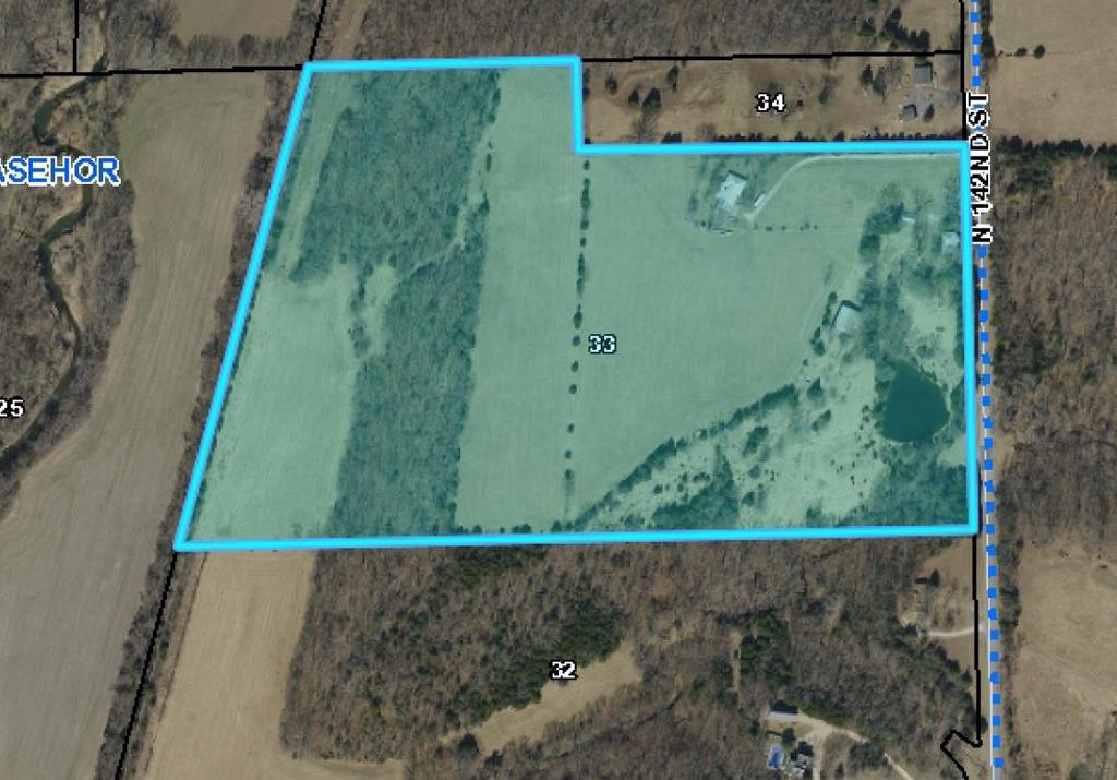 SITE CHARACTERISTICS: The site is approximately thirty-six (36) acres in size located west of N. 142 nd Street and north of State Avenue.