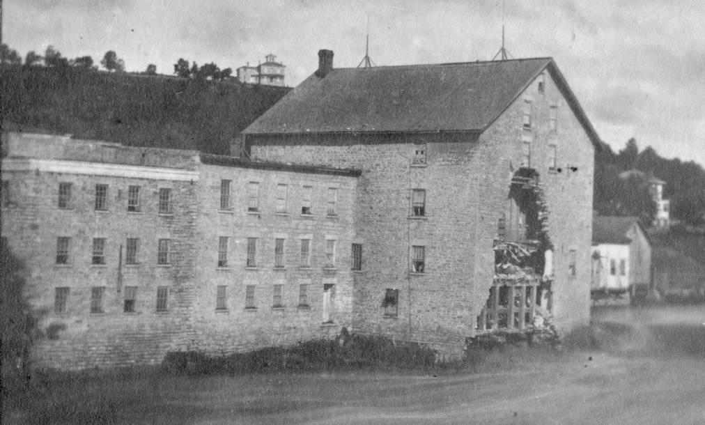 Page 9 Photographs: Historic views, top Elkader Mill following flood in June 1880 when