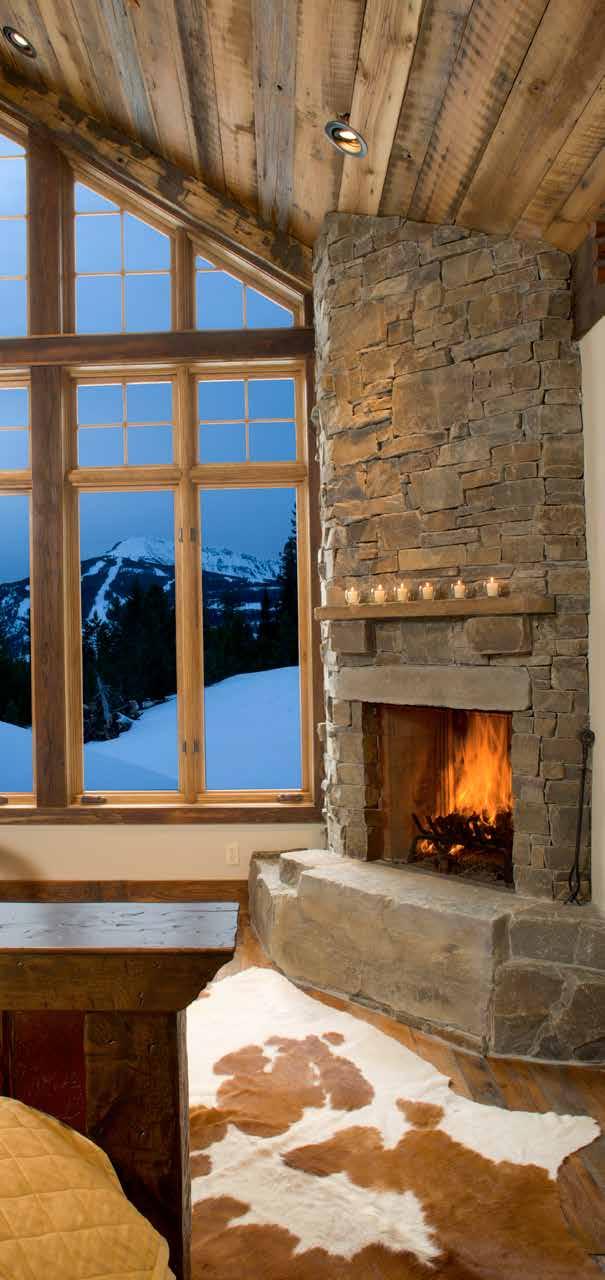 ANDESITE RIDGE 17 23 ANDESITE RIDGE ROAD ucked into a private corner of wilderness, Andesite Ridge Residence 17 represents the T beauty of the Montana Rocky Mountains, and provides the perfect