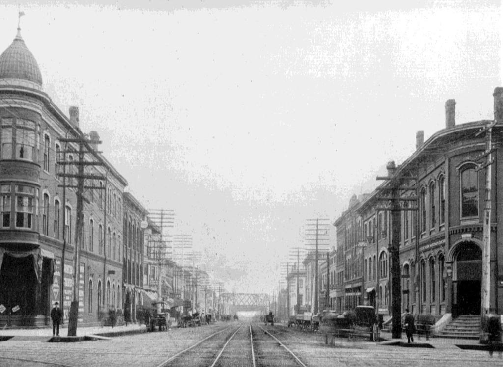 Page 9 This undated image documents the view of East Third Street, looking east from Brady Street near the turn-of-the-century - prior to the construction of Hotel Blackhawk, which, in 1915 would