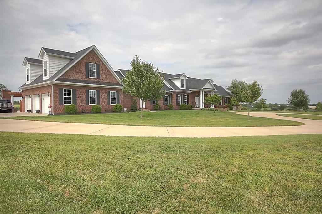 2629 Our Native Lane is a true gem in the Bluegrass boasting privacy yet glorious views of horses running in the fields of historic Calumet and Three Chimneys farms.