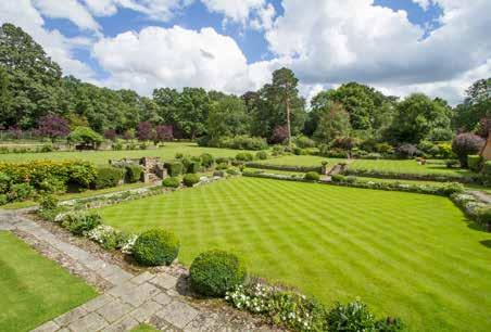 OUTBUILDINGS Gardens and Grounds Externally the grounds extend to 16 acres and comprise a beautiful design and maintained inner garden with parkland surrounding leading on to a field and a wood.