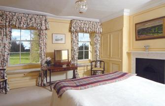 A superb view down the tree-lined avenue and beyond. Built in wardrobes. Marble fireplace with iron grate. (Currently not used). Central ceiling rose and ceiling coving.