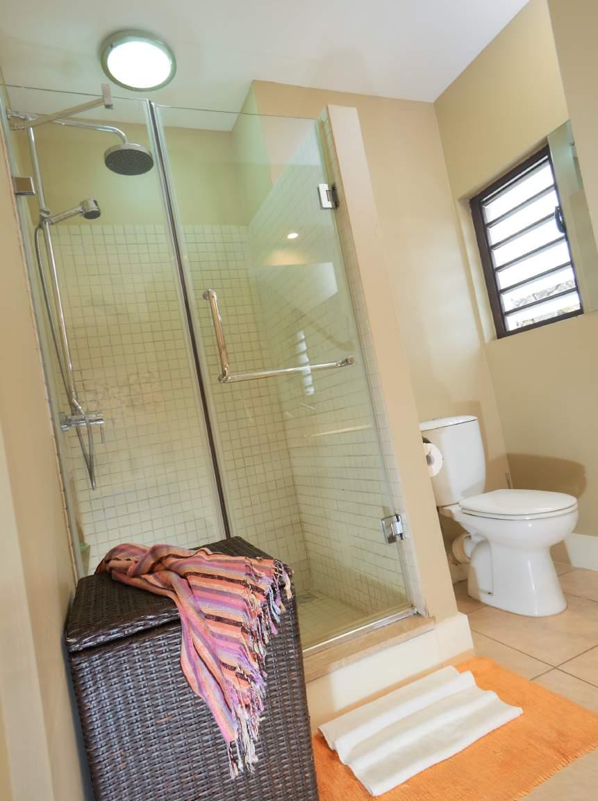 SUITES (110M2) Master bedroom Spacious en-suite bathroom with shower & toilet. King-size bed, Plasma TV, air-conditioning, ceiling fan & digital safe.