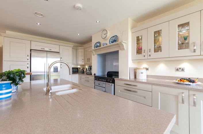 This stylish home boasts underfloor heating throughout, as well as a sound system both zone controlled, USB charging points and LAN connectivity throughout.