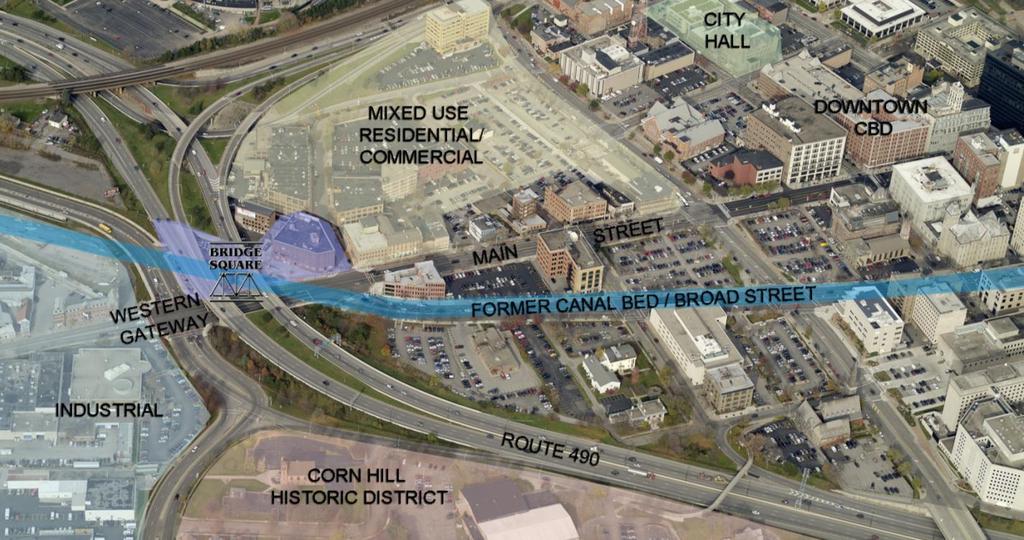 SITE CONTEXT- The former canal and the current Broad Street fronts the building site. Route 490 provides a concrete boundary to the south and west.