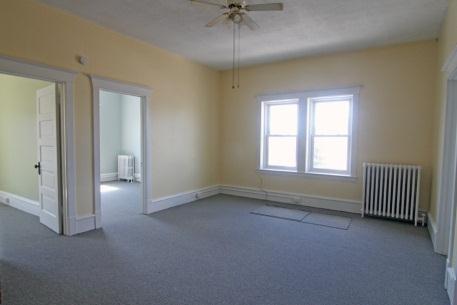 Current set up features two large private offices, one open office space, kitchenette, bathroom and storage.