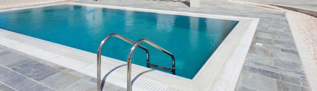 PRIVATE POOL The private pool boasts elevated, marble channeled overflow with