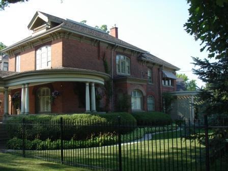 The distinguishing features include, a balanced façade, half columns on the large portico, and a simplified roof design.