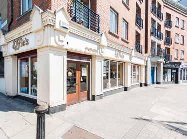 LOT 2: UNITS AT DEAN COURT, DEAN STREET LOCATION The subject parade occupies a high profile location at the busy intersection of Dean Street and Patrick Street.