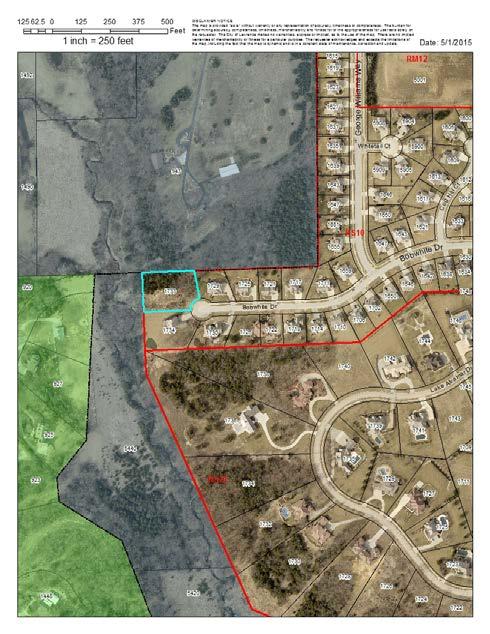 This plat will divide the tract into a lot that will accommodate a single-dwelling structure and a tract that will retain the existing drainage easement and contain the regulatory floodplain.