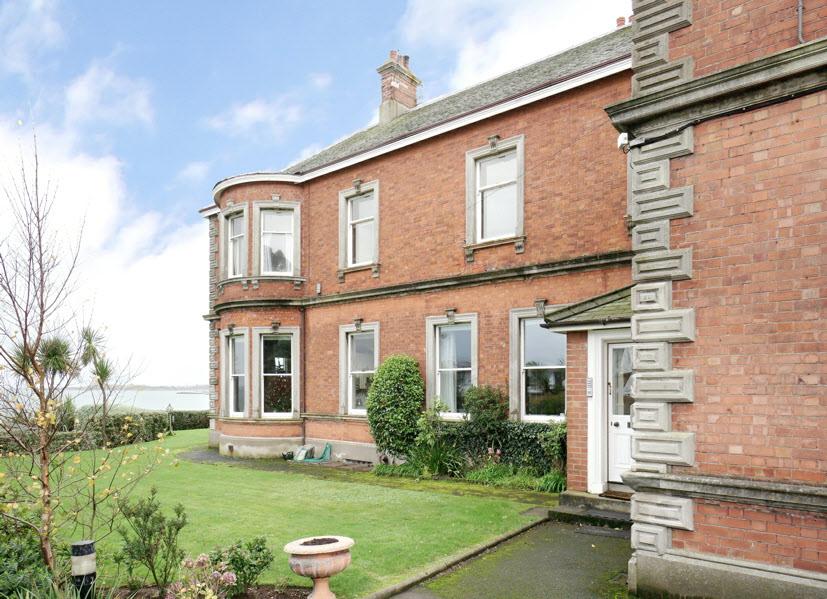 Attractive First Floor Apartment in elegant period residence with outstanding Lough views Magnificent Drawing / Dining Room with bay windows enjoying the wonderful vista & double doors to Dining Room