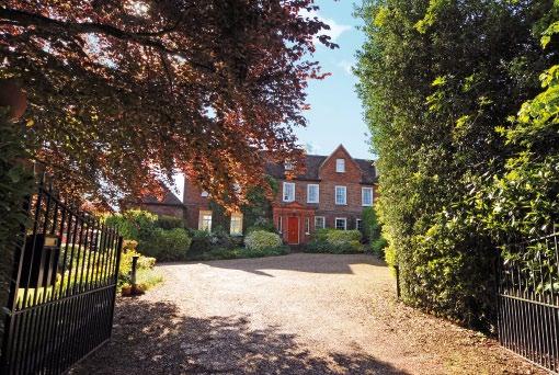 A substantial Grade II Listed Georgian village house situated in a quiet private avenue in the centre of this most sought