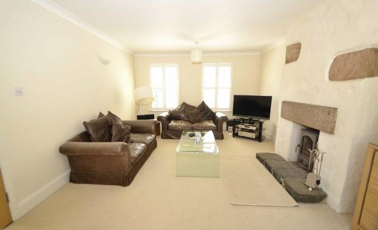 The lounge is light and airy with a working stove fireplace and double doors leading to the rear garden. The kitchen/dining room has been fully fitted and also has double doors to the rear garden.