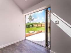 Entrance Hall Double glazed pre finished timber door to front elevation, under stairs cupboard with solid oak door, ceramic tiled floor with under floor heating, stairs to first floor galleried