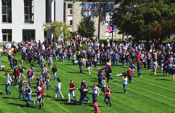 SEPT An estimated 600 shoeless feet are the first to rush onto the sparkling new grass at the opening of Haber