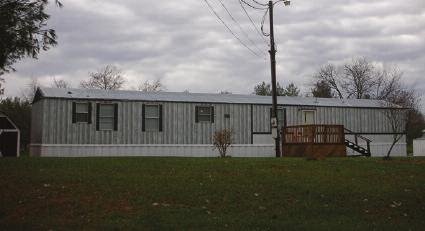Reduced to $69,900 SINKING CREEK #94502 Single Wide Mobile Home with Living Room, Kitchen and Dining Area, 3 Bedrooms, 1 1/2 Baths.