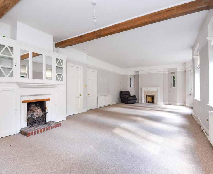 Lone Pine A substantial detached family house, built in the Arts and Crafts style, set within lightly wooded grounds.
