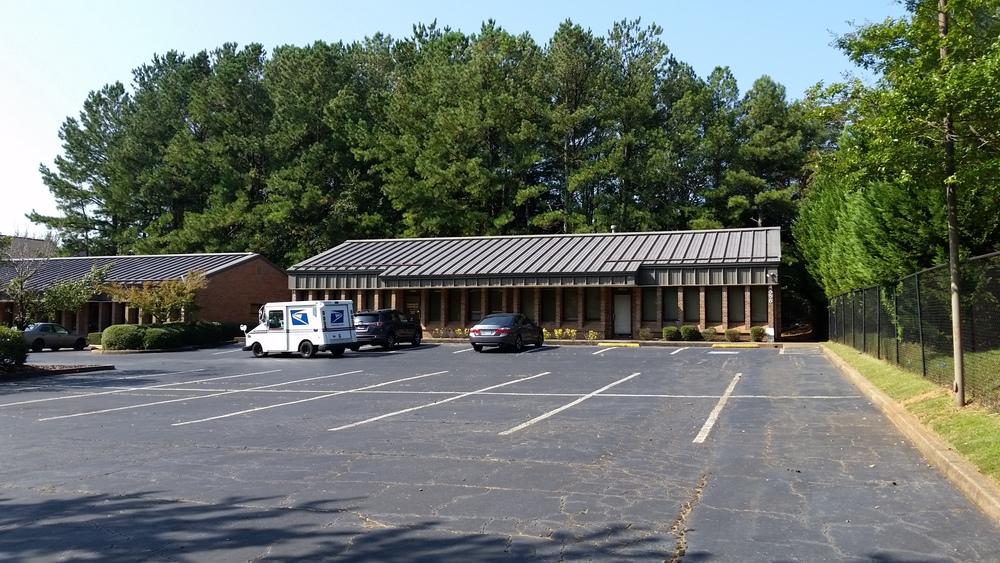 Complete Highlights SALE HIGHLIGHTS Medical Office Building Highly traffic location Great visibility and access Signage on Jimmy Carter Blvd 3,040 sf brick building with metal roof 33 parking spaces