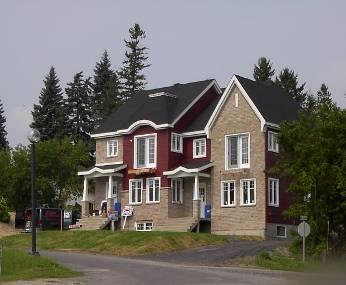 three to five attached dwelling units, consolidated into a single