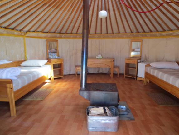 3. Guru camp Guru Camp is located in the beautiful area Bumbat /Terelj National Park/, 50 km from UB, surrounded by mountains, uniquely formed