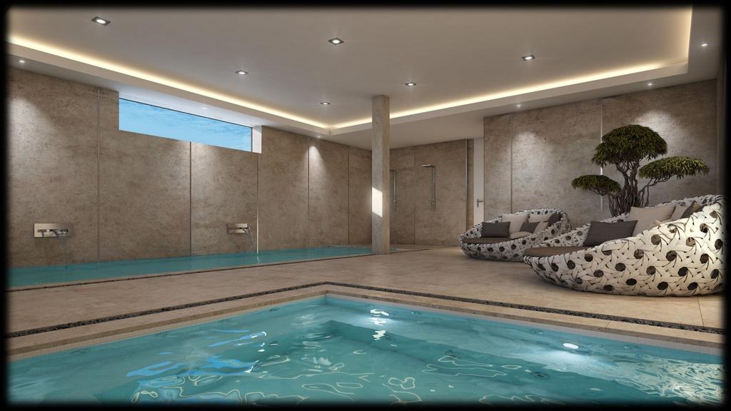 Acquiring light from the outdoor pool, the basement presents a heated indoor swimming pool, jacuzzi and open showers.