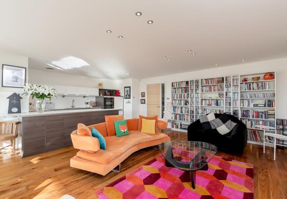 A stunning, contemporary three bedroom, third floor apartment forming