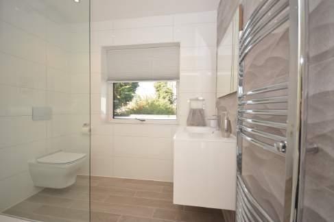 BEDROOM ONE 28 8 OVERALL X 19 7 : EN SUITE SHOWER ROOM/WC: A fabulous master bedroom suite with double doors from the