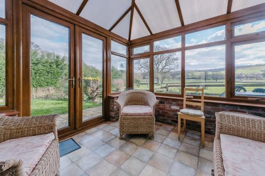 A downstairs toilet leads off from the rear of the kitchen. Plumtree Cottage with Personal Hot Tub A three bedroom traditional rural cottage with three en-suite bedrooms.