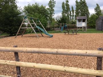 Outside facilities: We have a children s safe bark play area with swings, slide, two trampolines, Wendy house and picnic tables.