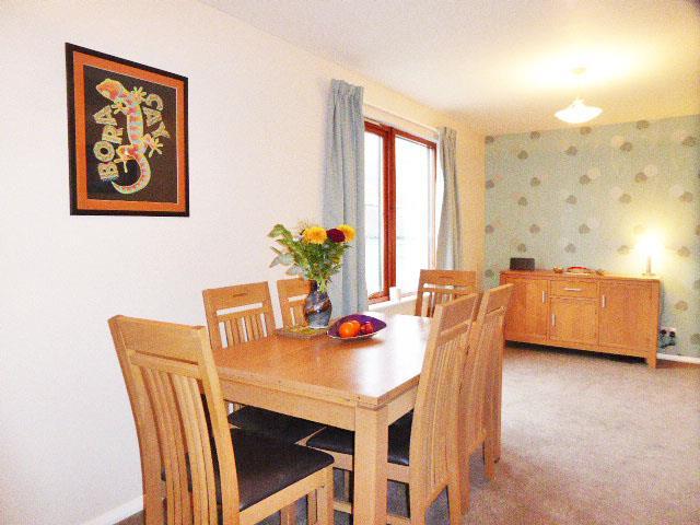 To the kitchen area there is laminate effect vinyl flooring and the dining area carpet. Dining Area 6.15m x 2.