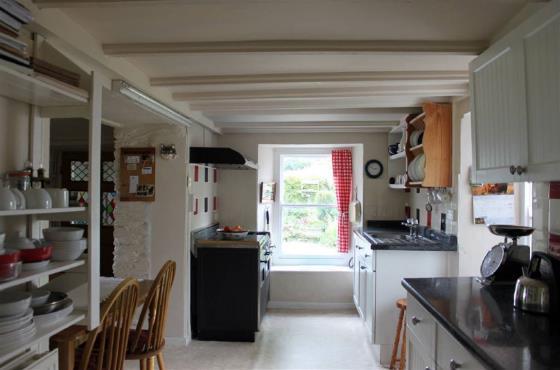 cupboard, 2 radiators. Lovely Inglenook Kitchen 16' 9'' x 8' 10'' (5.11m x 2.