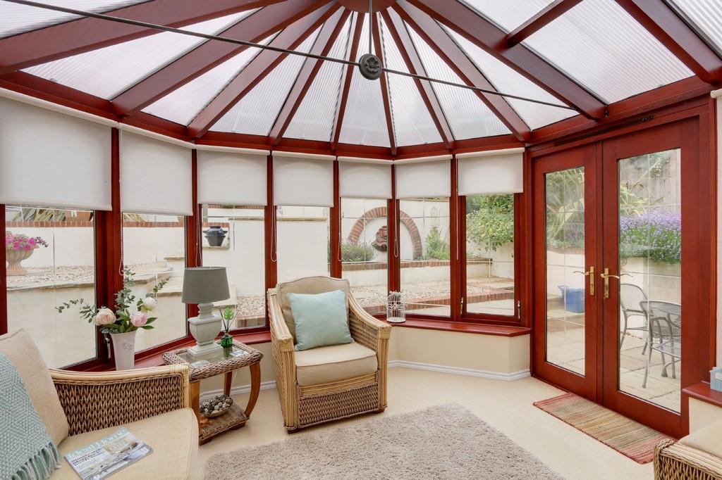 the details A modern detached, four-bedroom family home with a garage, conservatory, and enclosed, sunny rear garden, in a quiet, cul-de-sac location, in the seaside town of Teignmouth.