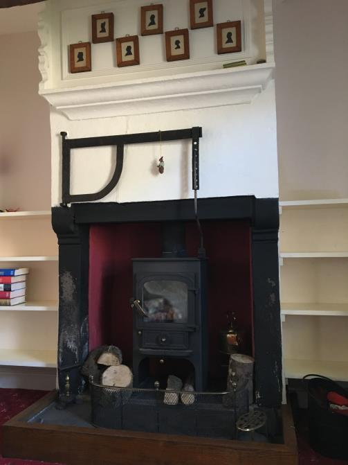 13m max (14 10 x 10 3 ) with fireplace, archway to kitchen fitted with base units. 1.53m x 1.61m (5 x 5 3 ) and 2.61m x 1.81m (8 7 x 5 11 ) boiler located here. 2.54m x 1.