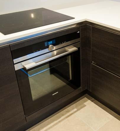 KITCHEN Bespoke German designer kitchens and Quartz stone worktops With built-in: Siemens active-clean multi-function oven Siemens IQ