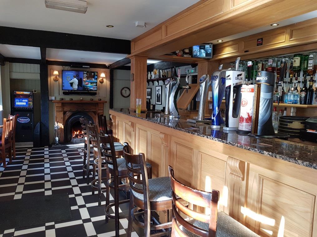 PUBLIC BAR Accessed directly through an entrance porch at the front of the premises the public bar can accommodate approximately 50 patrons on a range of upholstered cubicle