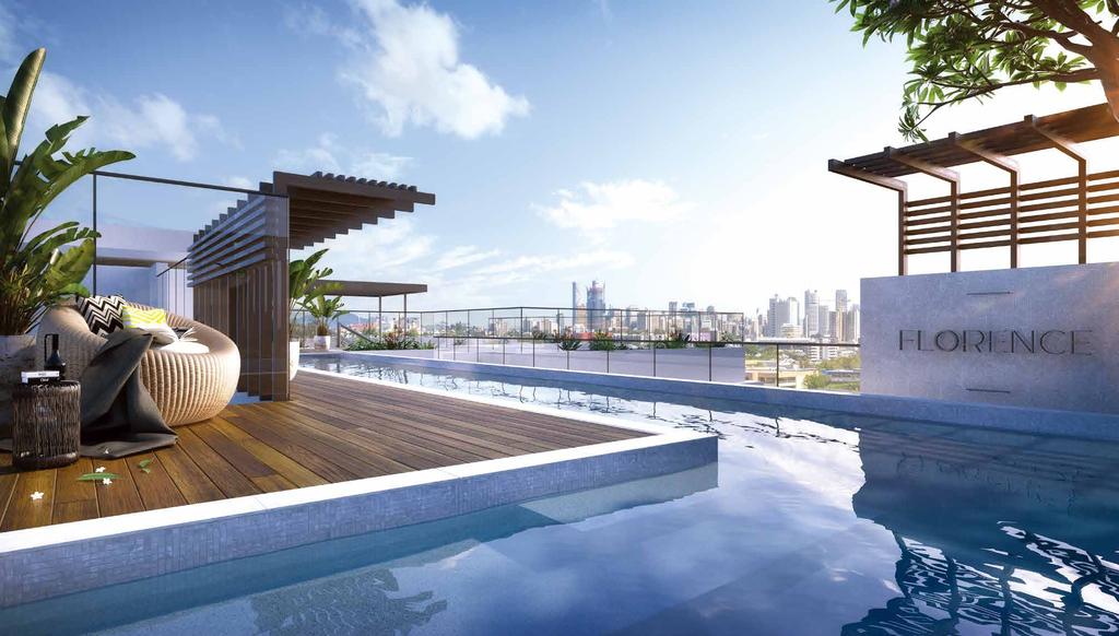 A sparkling lap pool with viewing portholes is impressively suspended across the two buildings.