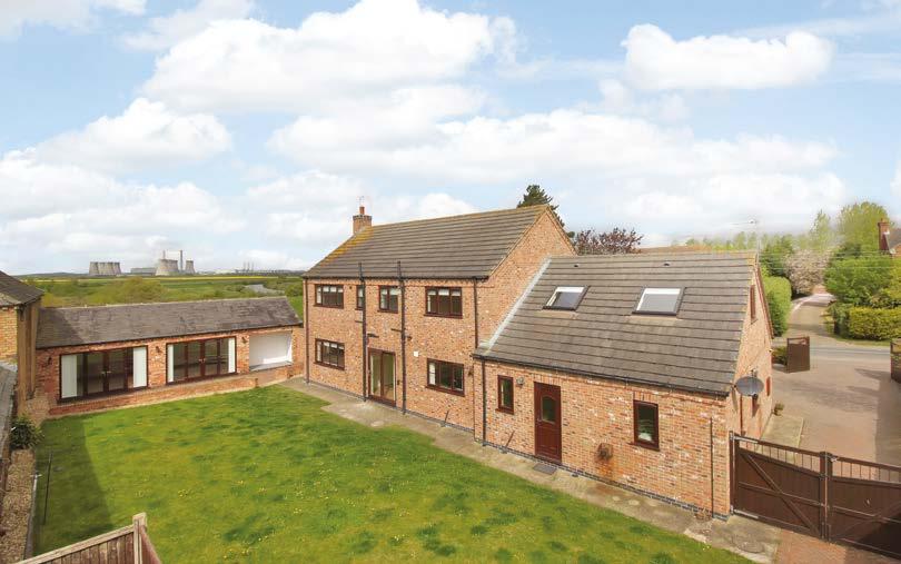 Trent View, Knaith Hill, Knaith Lincoln - 14 miles Newark - 21 miles Enjoying an elevated and commanding position, with far reaching views, this impressive individual home offers beautifully