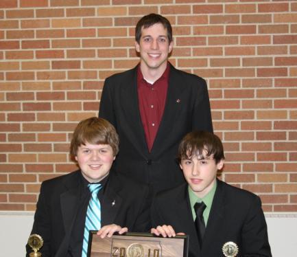 STATE CLASS "AA" POLICY DEBATE RESULTS Class AA Policy Debate Champions: (l to r) Colter Heirigs & Thomas Friedrichsen with Coach Kerry Konda, Aberdeen Central Champion Team Aberdeen Central (17X)