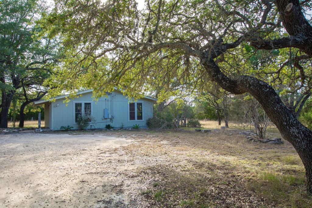 There is a 2,880 sq ft 3Br 2Bath main home positioned for Hill Country views on the highest elevation of the property. The views are staggering and panoramic.